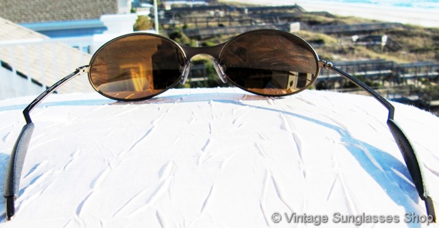 Oakley E Wire Copper Gold Iridium Sunglasses display picture 1
